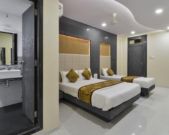 Hotel Aroma - มุมไบ - ห้องนอน