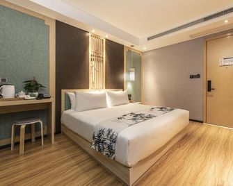 Enze Aizhu Hotel - פוז'ו - חדר שינה