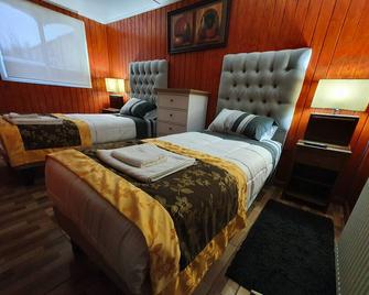 Hotel Forjadores del Cabo de Hornos - Puerto Williams - Bedroom