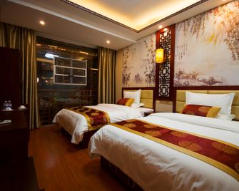 Miaodu Impression Hotel - Qiandongnan - Bedroom