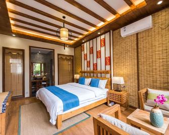 Lijiang Yue Tu Inn - Lijiang - Yatak Odası