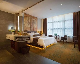 James Joyce Coffetel (Zunyi Bozhou Nanbai) - Zunyi - Habitación