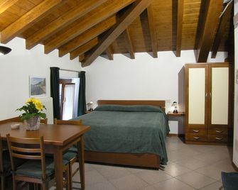 Antico Pozzo Apartment - בילאג'ו - חדר שינה