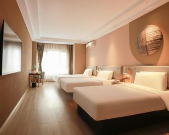 Home Inn Neo Harbin West Station Wanda Plaza Jinjue Wanxiang - Harbin - Habitación