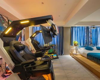 Jingyuan Movie Sporting Hotel (Weihai Weigao Shopping Plaza Weihai Municipal Government Branch) - Weihai - Habitación