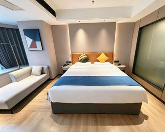 Ganzhou Xiangjiang International Hotel (Da Vinci Vientiane City Branch) - Ganzhou - Bedroom