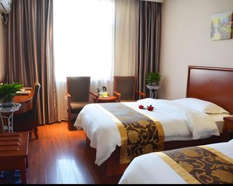 Greentree Inn Fuyang Shopping Mall - Bozhou - Спальня