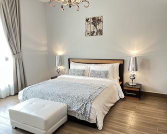 Al Manzil Hotel Bahrain - מאנאמה - חדר שינה