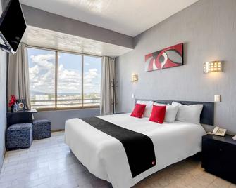 Guadalajara Express Tonala - גוואדאלחארה - חדר שינה