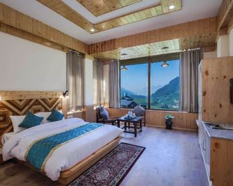 Bedroom in a stone and wood chalet admist apple garden - Manali - Chambre