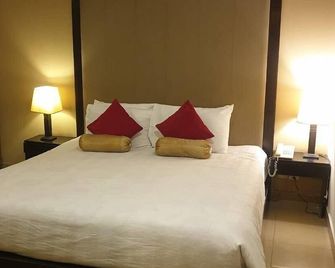Hotel Grand Inn - Lahore - Kamar Tidur