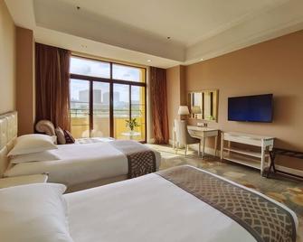 Suning Universal Hotel - Nankín - Habitación
