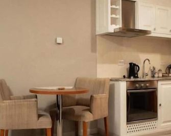 Las Bayas Home Suites - Esquel - Cozinha