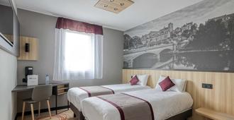 Brit Hotel Le Cottage - Arnage - Schlafzimmer