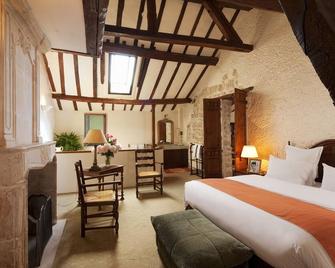 أوتل دونجلتير سان جيرمين دي بري - باريس - غرفة نوم