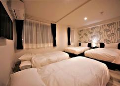 Cozy Inn Otaru - Otaru - Camera da letto