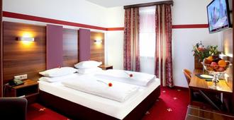 Hotel Burgschmiet - Norimberga - Camera da letto