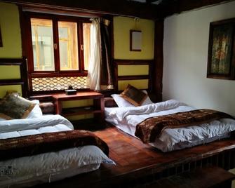 Shangri-La Eight Symbole Lotus Inn - Diqing - Bedroom