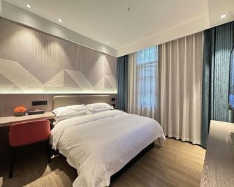 Borrman Hotel Deyang Wuzhou Square - Deyang - Schlafzimmer
