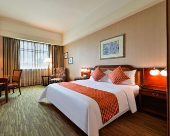 Zhongshan Sunshine Holiday Hotel (Zhongshan Pedestrian Street Xingzhong Plaza Store) - Zhongshan - Habitación
