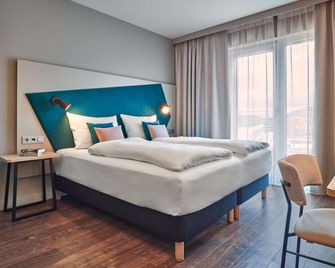Aparthotel Adagio Heidelberg - Heidelberg - Schlafzimmer