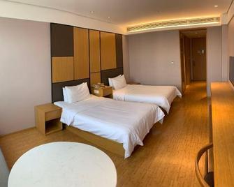 Ji Hotel Changzhou South Tongjiang Road Hotel - Changzhou - Slaapkamer