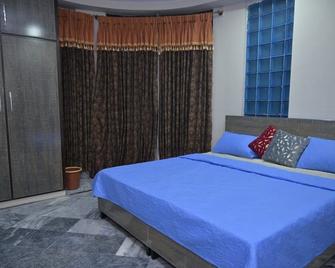 Royal Suites Hotel - Faisalābād - Bedroom