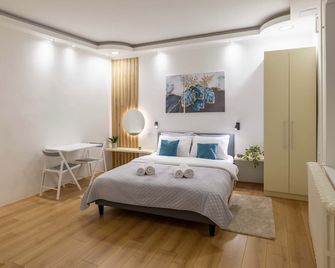 Old Town Rooms - Novi Sad - Schlafzimmer