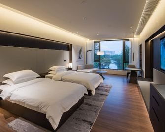 Donghu Grand Hotel - Цзеян - Спальня