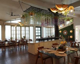 Blizz Hotels & Resorts - Paliā Kalān - Restaurante