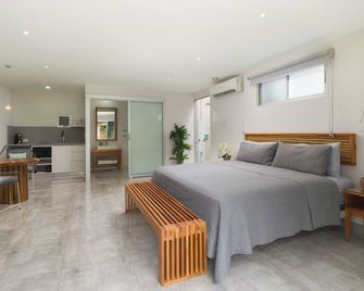 Tamarindo Bay Boutique Hotel, Apartments & Suites - טאמרינדו - חדר שינה