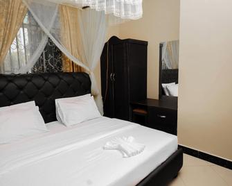 Enjoy serene stays at our vacation home - Dodoma - Bedroom