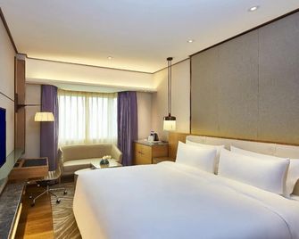 Shijiazhuang International Building Hotel - Shijiazhuang - Bedroom
