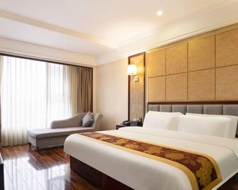 Meishan Dongpo Celebrity Grand Hotel - Meishan - Bedroom