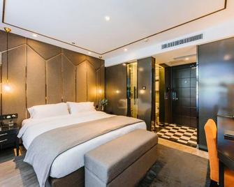Kunlun Heyue Resort Hotel (Qingdao Olympic Sailing Center, May Fourth Square) - Qingdao - Habitación