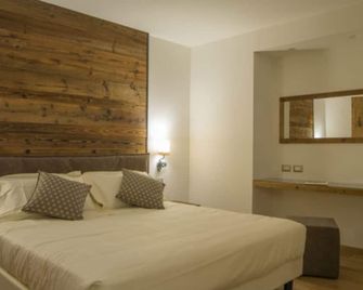 Hotel Garnì Caminetto - Madonna di Campiglio