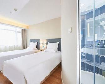 Hanting Hotel (Nanjing Jiangning Golden Coast) - Nankín - Habitación