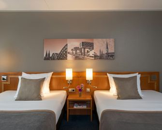 Leonardo Hotel Köln Bonn Airport - Köln - Schlafzimmer