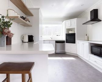 Charming 3-Bedroom Home with Sunroom & Parking - East Launceston - Kitchen