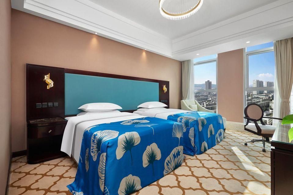 Xining Xingwang International Hotel - Xining - Camera da letto