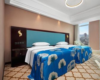 Xining Xingwang International Hotel - Xining - Camera da letto