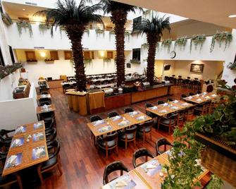 Harmoni Suites Hotel - Lubuk Baja - Ravintola