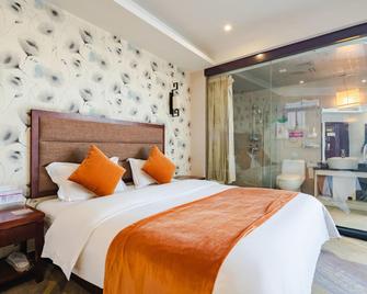 Yuanhua Hotel - Liangshan - Quarto
