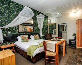 Umlilo Lodge - Saint Lucia - Bedroom