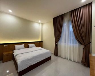 Penginapan Jangkar - Luwuk - Yatak Odası