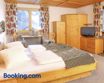 Hotel Garni Madrisa - Brand - Habitación