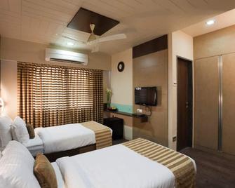 Skylark Business Hotel - Kolhāpur - Bedroom