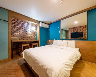Dajeon Jungni Page Hotel - Daejeon - Bedroom