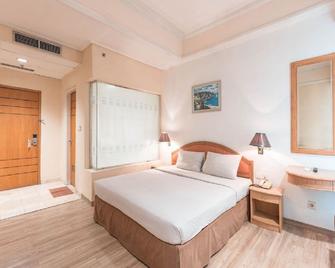 Hotel Bulevar Tanjung Duren Jakarta - ג'קרטה - חדר שינה