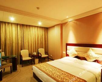 Yixing Hotel - Zhongwei - Bedroom